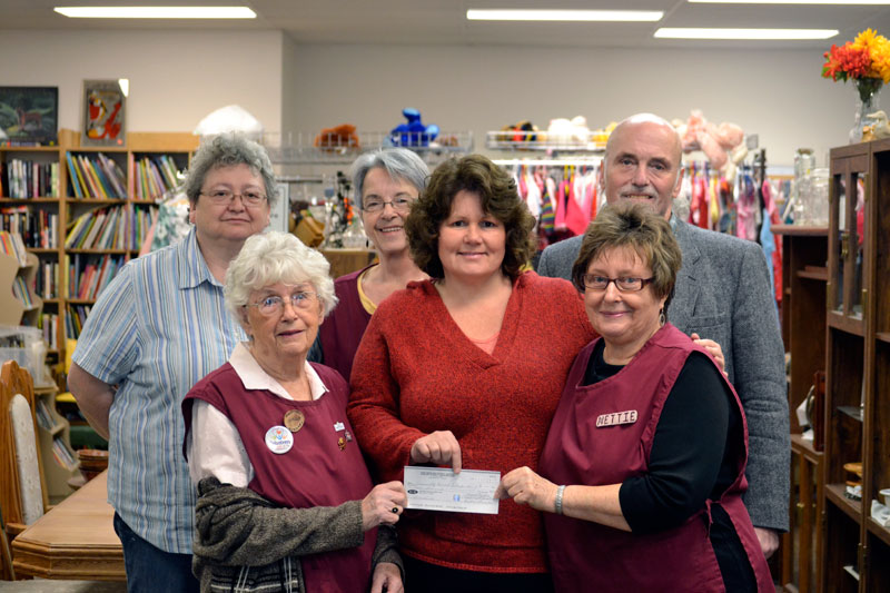 Hospital Auxiliary donation to the Harvest Food Bank.